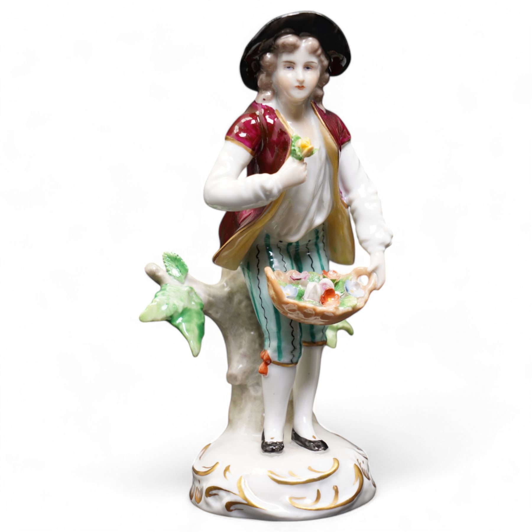 Group of Sitzendorf porcelain figures, one modelled as two children with birds and lambs, the others holding and offering flowers, each upon gilt detailed base, with painted marks beneath (4)