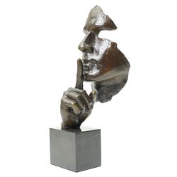 After Salvador Dali (Spanish 1904-1989) 'Serenity'- bronze figure with finger held to mouth, on black marble plinth H47cm