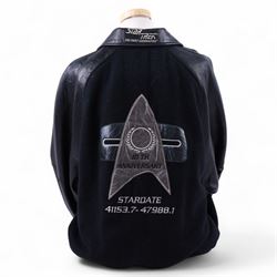 Star Trek The Next Generation 10th anniversary jacket, leather sleeves and collar with embroidered decoration throughout, including 10th anniversary emblem to back, 'Star Trek The Next Generation' to collar, 'Paramount Pictures Stages 8,9 & 16' to front and seven character names to interior, in size XXXXL, purchased in 1990s from Star Trek Experience Las Vegas