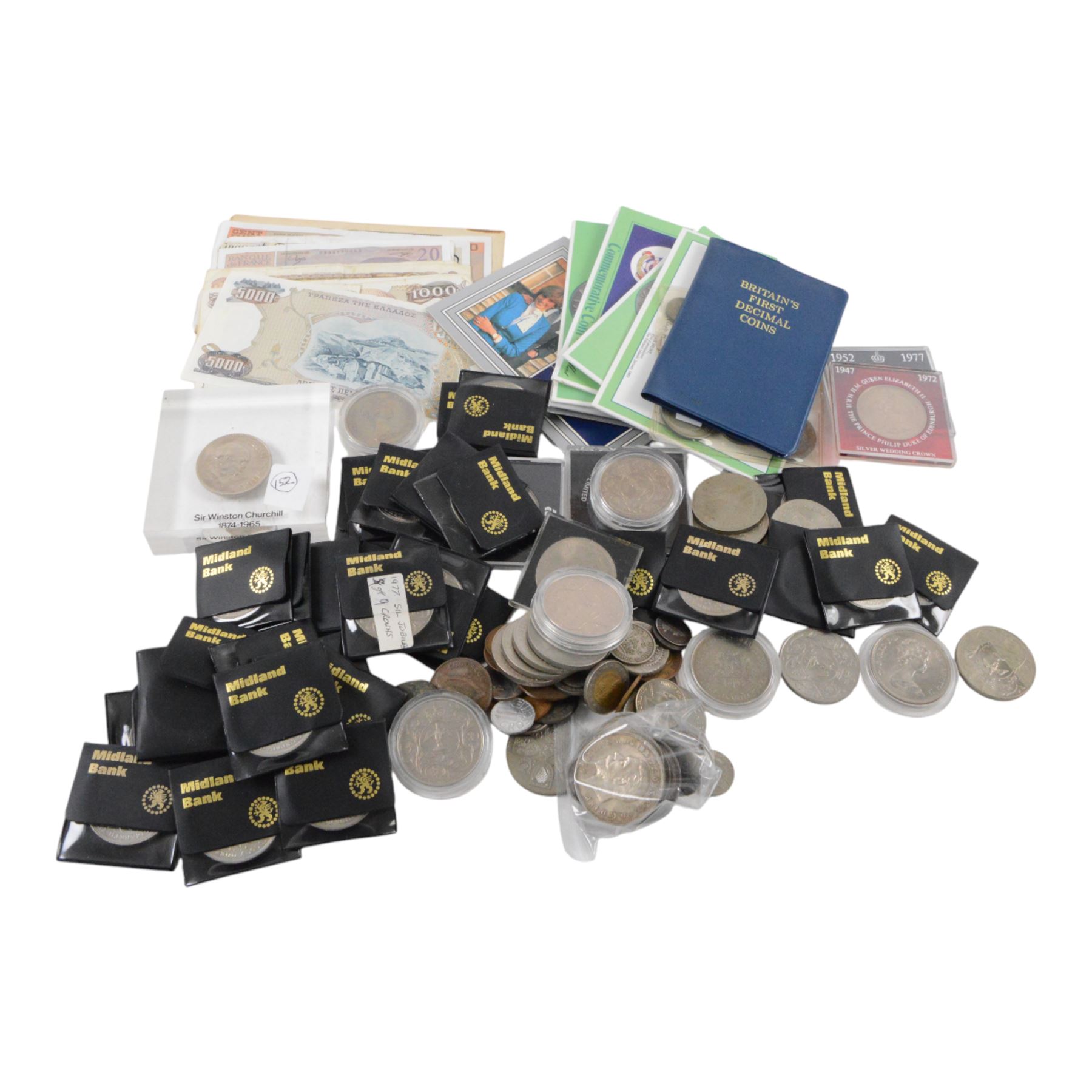 Approximately 250 grams of Great British pre-1947 silver coins, together with numerous commemorative crowns, further coins, banknotes, etc
