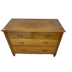 Late 19th century walnut chest, with moulded uprights fitted with two short and two long drawers with brass handles on turned feet
