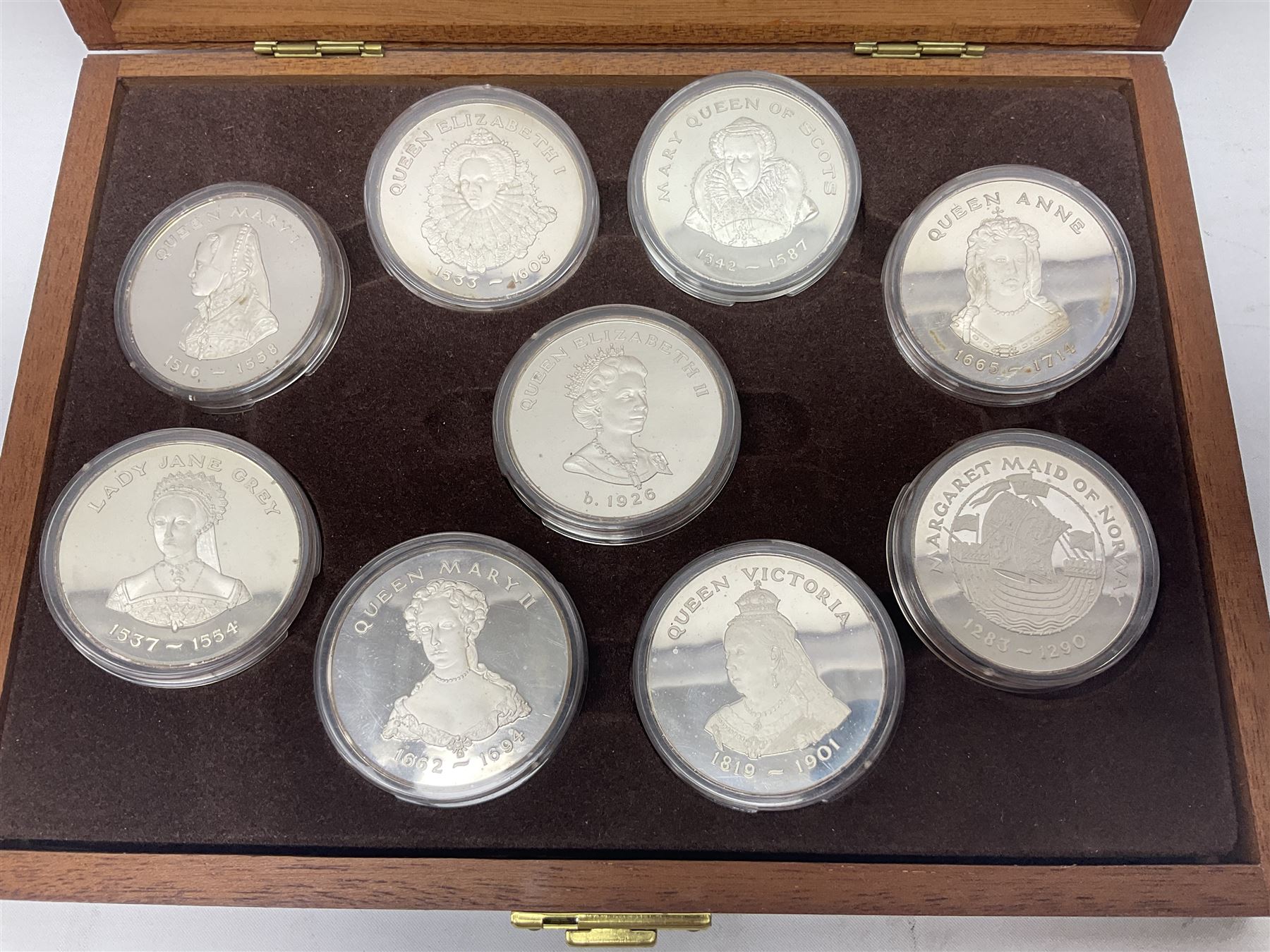 The Birmingham Mint 'The Queens Of The British Isles' sterling silver hallmarked nine medal set, housed in a fitted case, overall combined weight of the medals approximately 400 grams