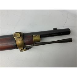 Manton .577/450 Martini Henry rifle, the 82.5cm smooth bored barrel proofed for shot, two barrel bands and bayonet fitting, engraved action with side safety, figured walnut stock with chequered steel butt plate, complete with ramrod, NVN other than 5346 on barrel, L125cm