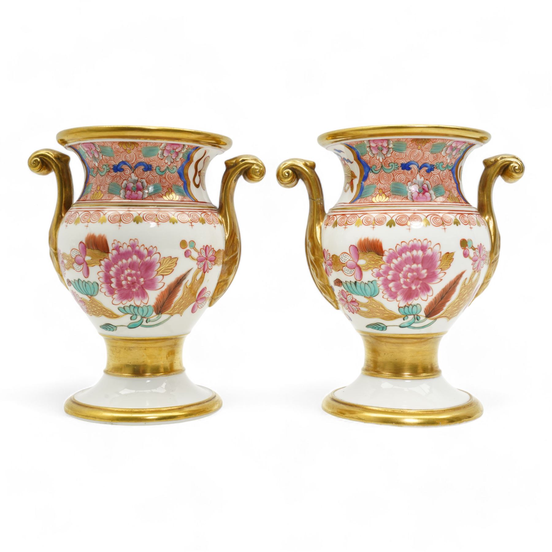 Early 19th century Spode vase and garniture, each decorated in the Japan pattern no. 868, with twin scroll handles and pedestal foot, H15.5cm max; together with Spode pen tray, pattern no. 093, L27cm; pastille burner, H8cm; and an 18th/19th century porcelain vase and cover, decorated with panels of flowers within orange and gilt bands, possibly Spode H16cm (6)