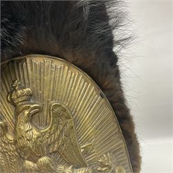 French Grenadier's bearskin hat, the embossed brass plate with crowned eagle, flaming grenades and arrow flashes; leather headband and traces of manuscript label internally