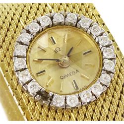 Omega ladies18ct gold manual wind wristwatch, round brilliant cut diamond bezel, on integrated 18ct gold bracelet, London 1964, boxed with guarantee dated 1965