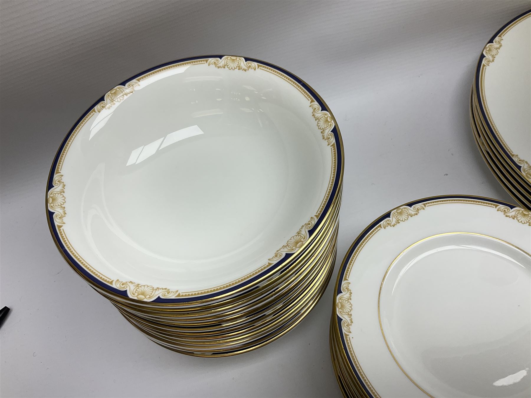 Wedgwood Cavendish pattern dinner service for twelve, comprising dinner plates, side plates, bowls, soup bowls, two tureens, saucer boat and sauce, together with matching part coffee service (82) 