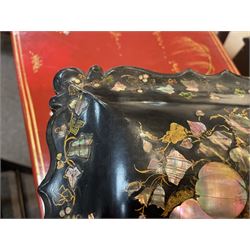 Victorian black lacquered papier-mâché sewing box, of rectangular form with shaped sides, the slightly domed top with inlaid mother of pearl and abalone decoration, the sides with gilt and polychrome painted scrollwork, the hinged cover opening to reveal a fitted interior with lift out tray, H14cm