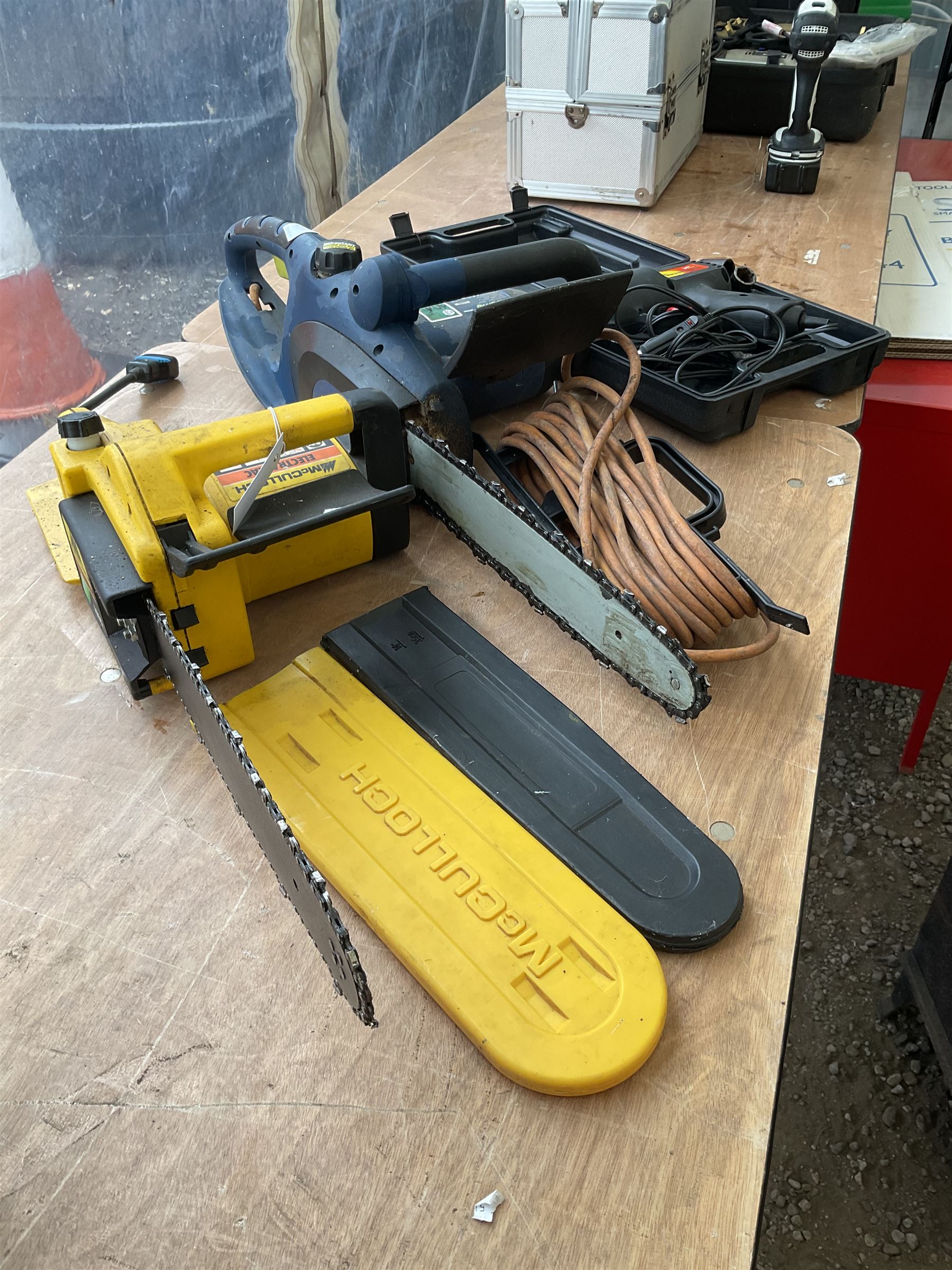 Pair of McCulloch and Challenge Extreme electric chainsaws together with electric Impact wrench  - THIS LOT IS TO BE COLLECTED BY APPOINTMENT FROM DUGGLEBY STORAGE, GREAT HILL, EASTFIELD, SCARBOROUGH, YO11 3TX