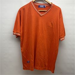 Collection of Leeds United scarves, hats and t-shirts, together with a Washington Redskins NFL sweatshirt and an Australian rugby league shirt