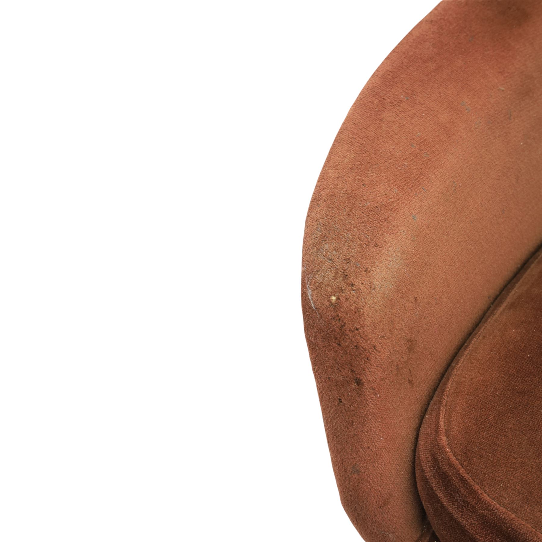 Pair of mid 20th century brown velvet swivel lounge chairs and matching footstool, the shaped and padded back with buttoned segmented cushion over conforming seat cushion, flared armrests and moulded sides, raised on a five point metal swivel base, the footstool en suite with buttoned cushion and matching metal base