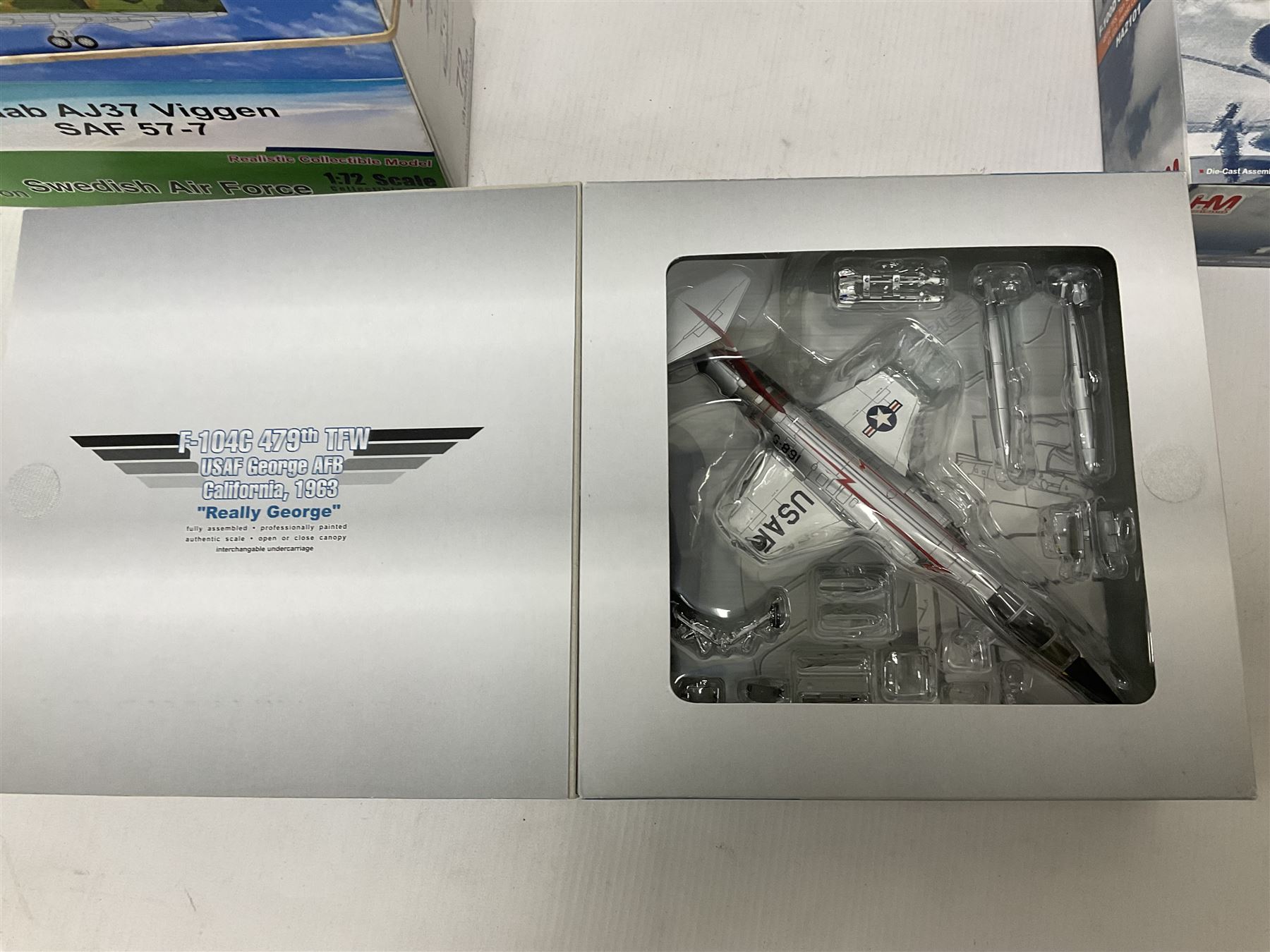 Four 1:72 scale model airplanes comprising two Aviation 72 models AV7242001 Sweden Air Force Saab AJ37 Viggen SAF 57-7 and AV7252001 Fairey Gannet; and two HobbyMaster models HA01001 and HA2101; all in original boxes