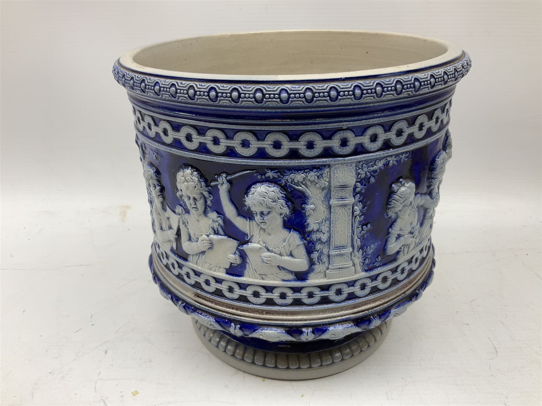 Three jardinières comprising West German Gerz example decorated in relief, Doulton Slaters example with frilled everted rim and a majolica example, and a further two Arthur Wood majolica jugs (5)