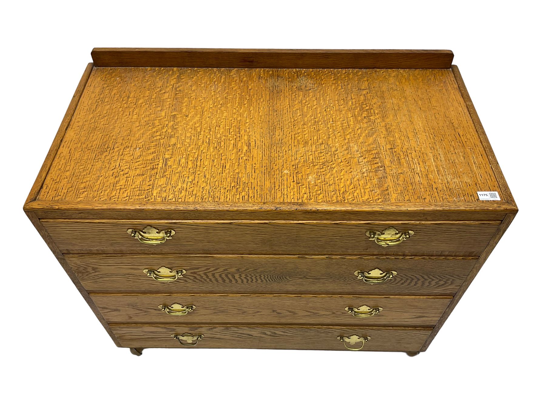 Mid-20th century oak chest, raised back, fitted with four graduating drawers, on castors