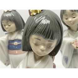 Six Lladro figures of the China doll set and Oriental doll set, comprising Playing the Flute no.6150, Bearing Flowers no.6151, Flower Gazer no. 6152, Oriental Dance no. 6230, Oriental Lantern no. 6231 and Oriental Beauty no. 6232, largest H20cm