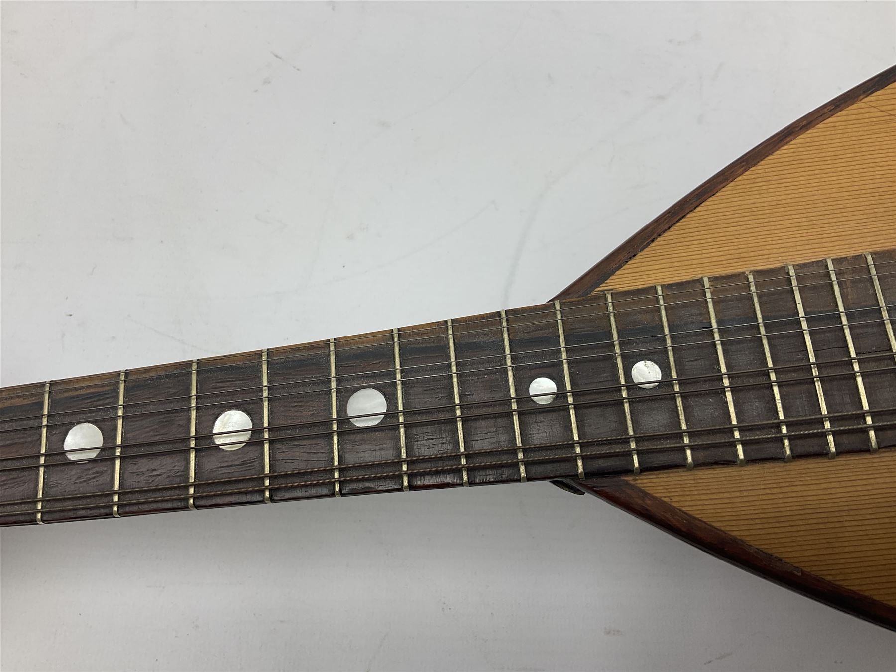 Italian mandolin, with foliate inlaid scratchplate, paper label inscribed 'Carlo Loveri & Figlio of Napoli', L62cm