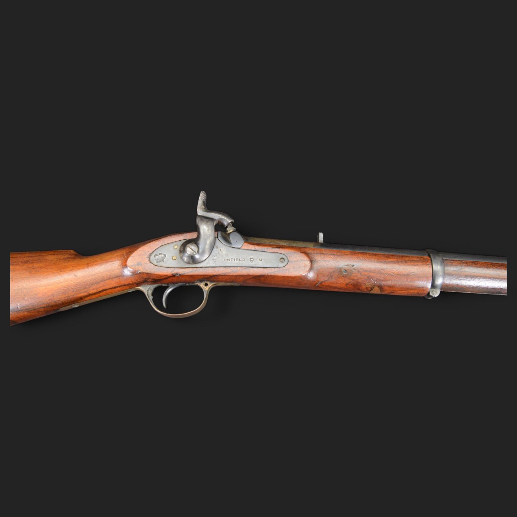 Enfield .577 action rifle, the 91.5cm rifled barrel with three barrel bands and ramrod under, full walnut stock, action marked 'Enfield' with Victoria cypher, overall L131cm