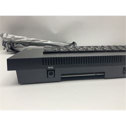 Sinclair ZX Spectrum (1984) with accessories and games; ten games for Sinclair Spectrum and 48K Spectrum to include ‘Knight Lore’, ‘The Way of the Exploding Fist’, and ‘Green Beret’ all in original boxes, ‘Rambo First Blood Part II’ without original box; Sinclair UK1400 Power Supply Unit, Hales Universal Mains Adapter, RAM Turbo Spectrum Joystick Interface, Starlite Cassette Player, all without boxes