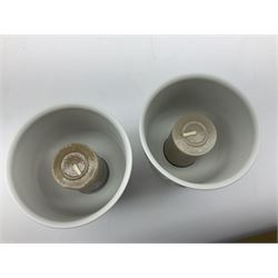 Lladro Collectors Society items, comprising of The Will to Create book, two candle holders; Sailing the Sea no 17665, Dolphins at Play no 17666, Plaque Bringing Us Together, key fob, leather wallet and a members joining pack with plaque, all in original boxes  