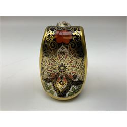 Four Royal Crown Derby paperweights, Llama, with gold stopper, Snake, with gold stopper, Honeybear, with silver stopper and Striped Dolphin, with gold stopper and box, all with printed mark beneath 
