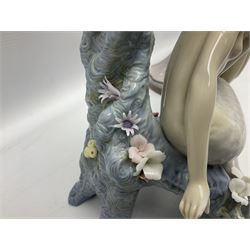 Four Lladro figures, comprising Touch of Class no 5377, Boy Student no 4517, Ocean Beauty no 5785 and Carnival Couple no 4882, largest example H45cm