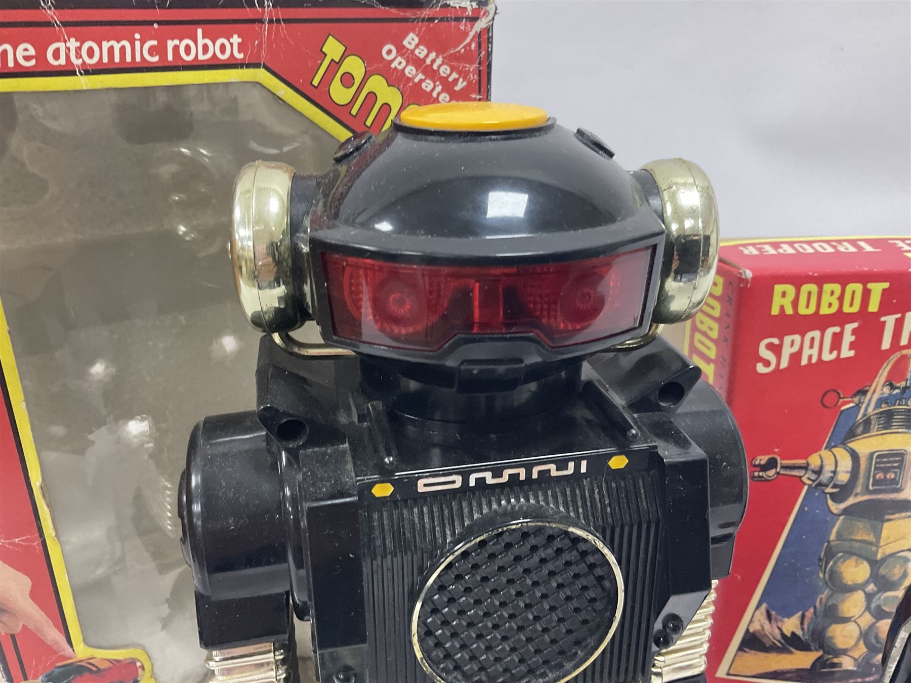 Three vintage battery operated robots comprising tin-plate Space Walk Man ME 100 Robot, Saturn the 13