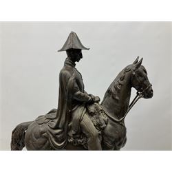 Large and impressive bronze figure of Wellington seated on a horse, on a sarcophogus shaped stepped base impressed 'Meunier Paris', the canted corners inset with battle trophies H68cm L50cm D22cm