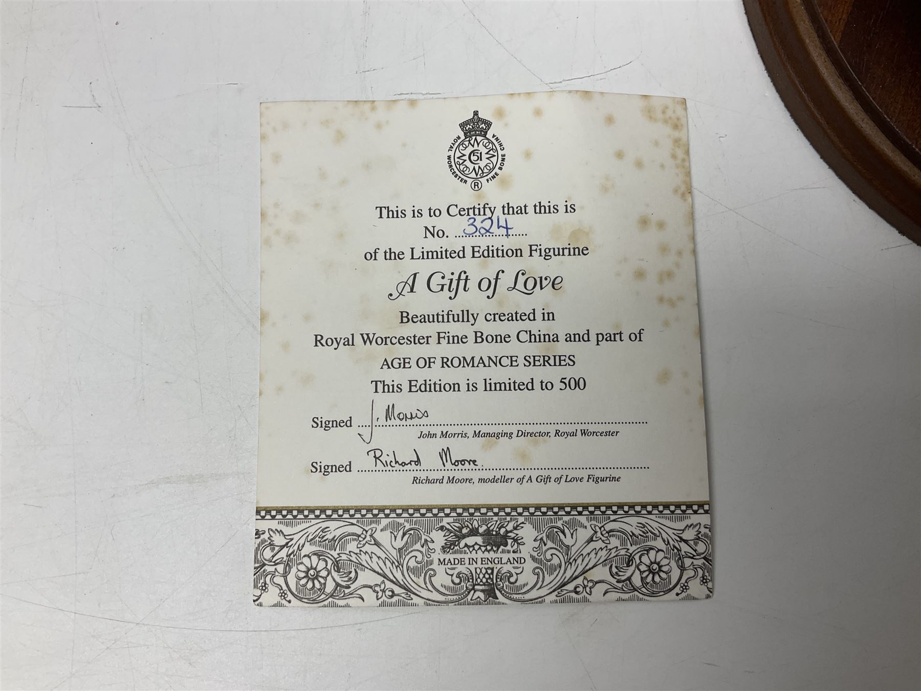 Two Royal Worcester figures, comprising A Gift of Love from the Age of Romance Series, limited edition 325/500, with certificate and original box and Royal Premier from the Glittering Occasions series, with original box 