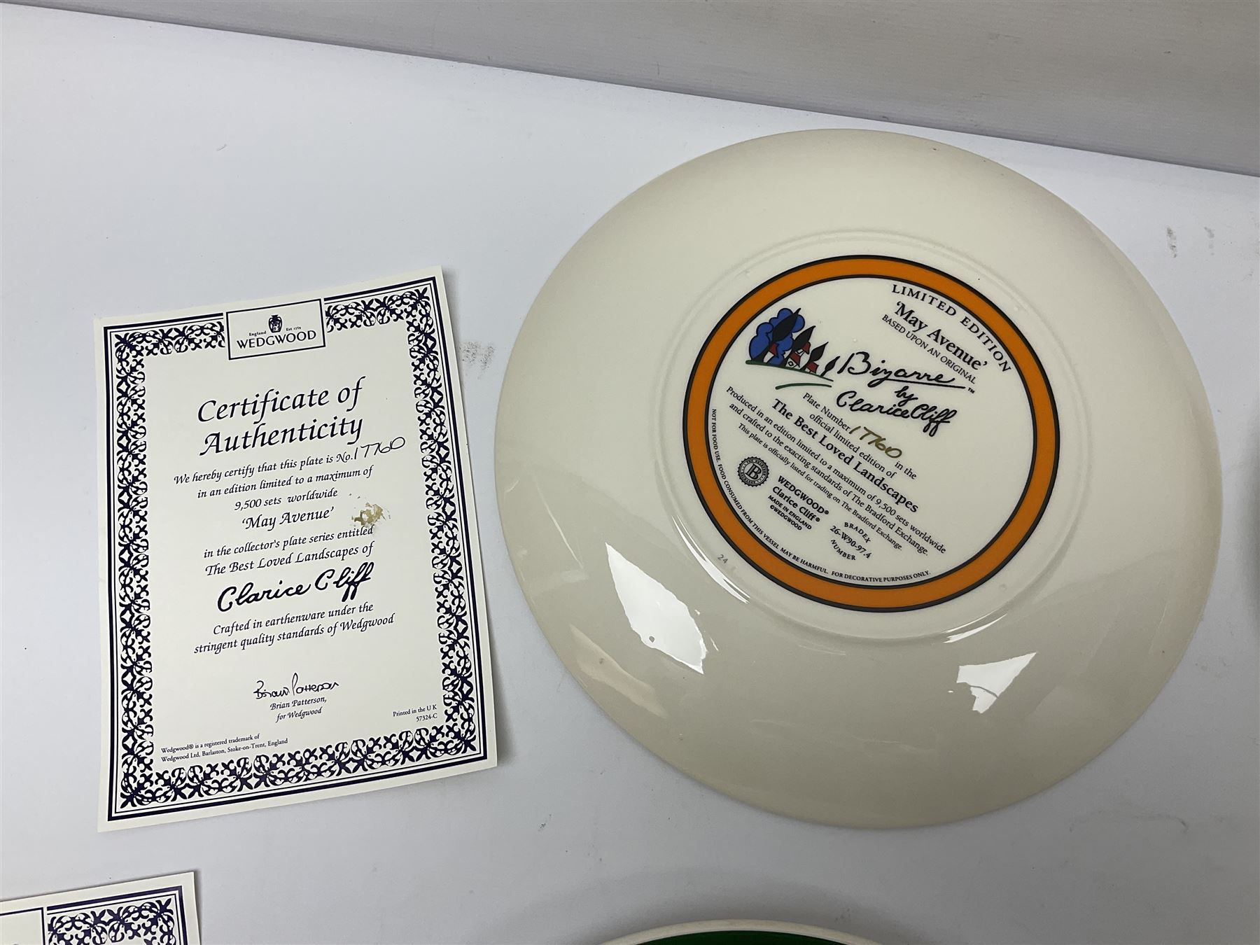 Four Clarice Cliff Wedgwood limited edition plates, comprising Orange Erin, Blue Firs, Solitude and May Avenue, all with certificate and box, D26cm