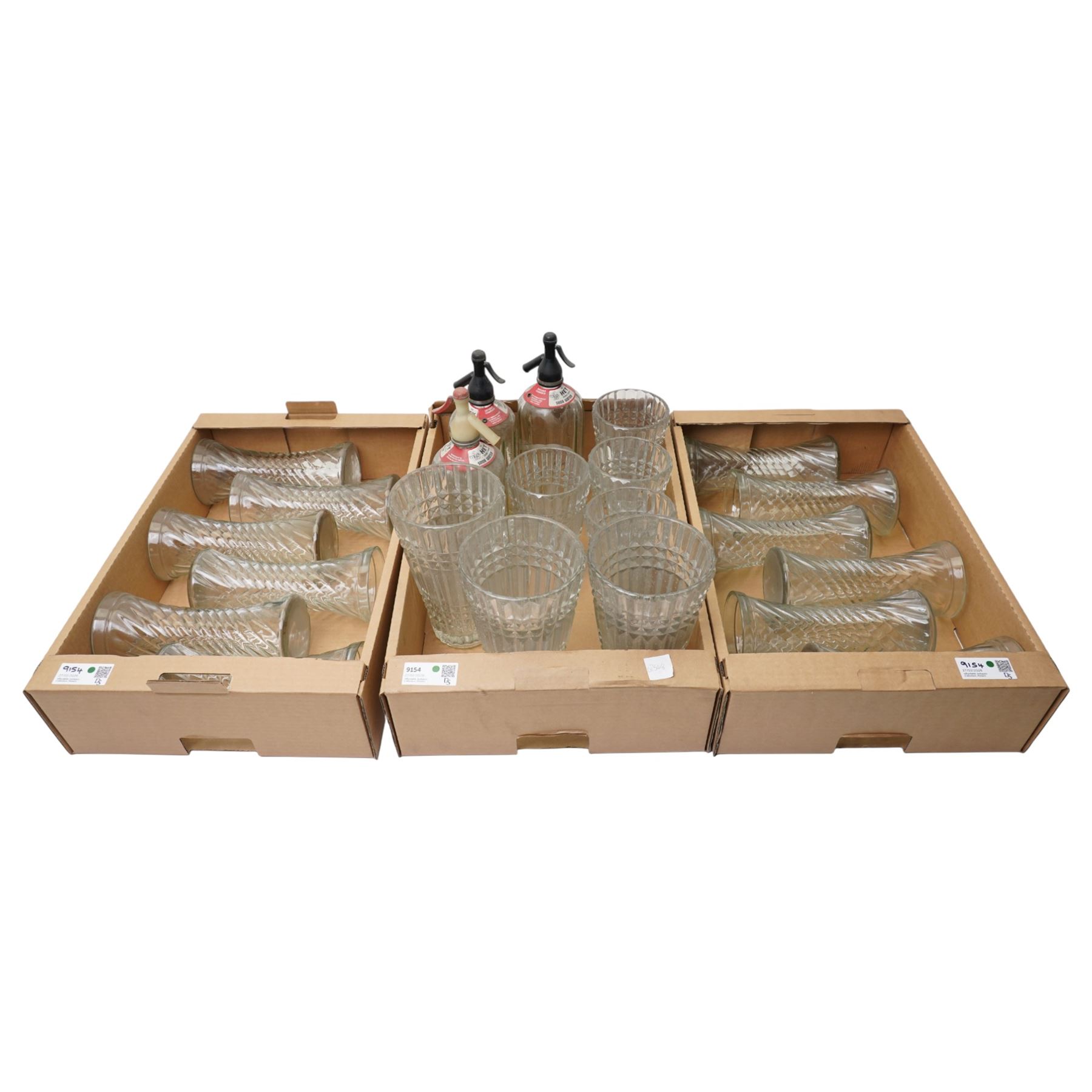 Set of twelve glass vases H25cm, three glass soda syphons and a set of seven glass vases in two sizes