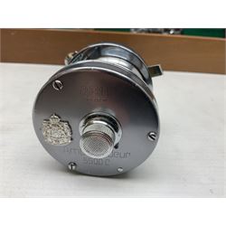 Four Abu fishing reels, comprising Ambassadeur 9000, Ambassadeur 7000, Ambassadeur 5500 and Ambassadeur 6500, together with additional line, hardy fishing bag and two wooden boxes