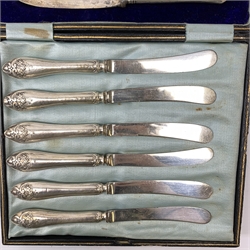 
A large quantity of assorted flatware, comprising of mainly silver plated examples, some with ivory and mother of pear handles, to include a small quantity of silver handled knives, button hooks, and teaspoon, and examples with silver ferrules, plus a number of base metal compacts, etc. 