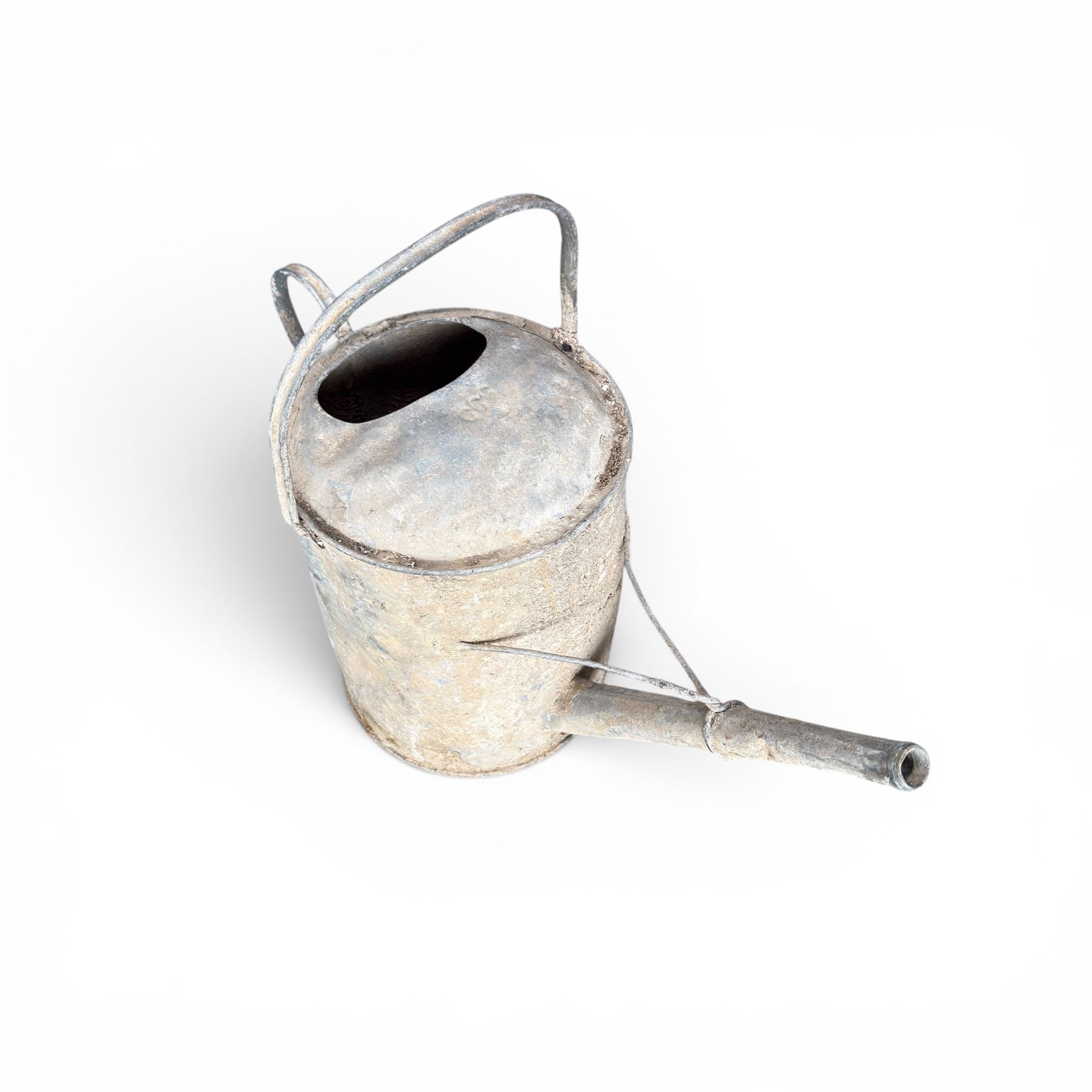 19th century milk churn with weathered patina along with aluminium watering can
