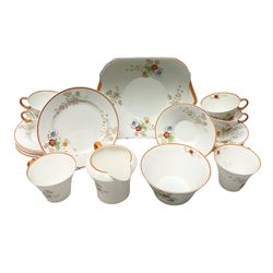 Shelley part tea service decorated in daisy and poppy pattern, comprising six cups and saucers, milk jug, open sucrier, six dessert plates and cake plate (21)