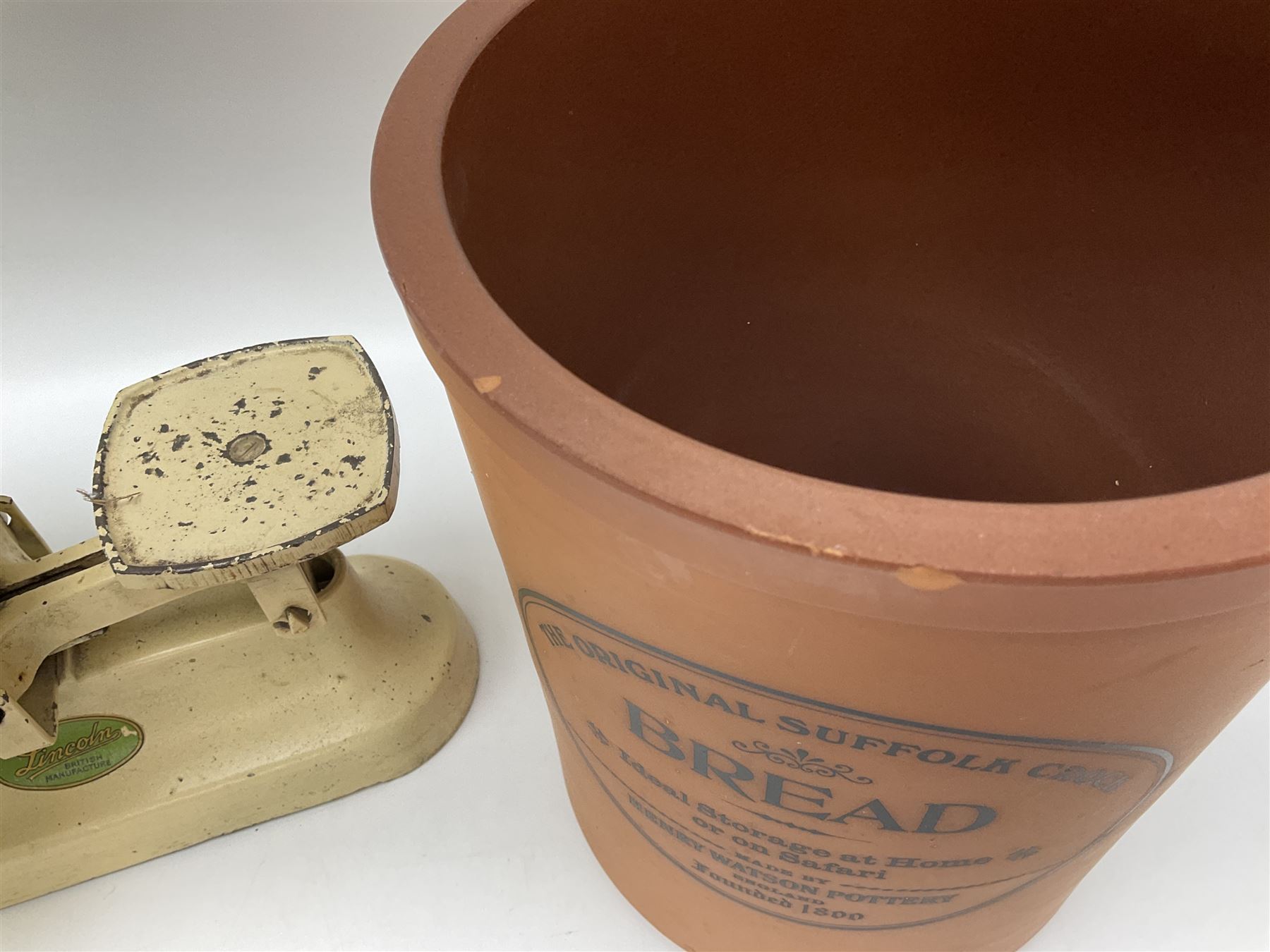 Terracotta bread bin, together with a pair of cast iron painted scales, bin H34cm