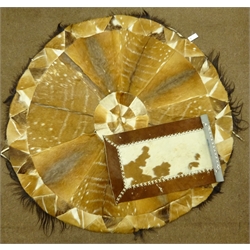  African patchwork Antelope skin rug of circular form, D157cm and a small Spanish cowhide rectangular rug   
