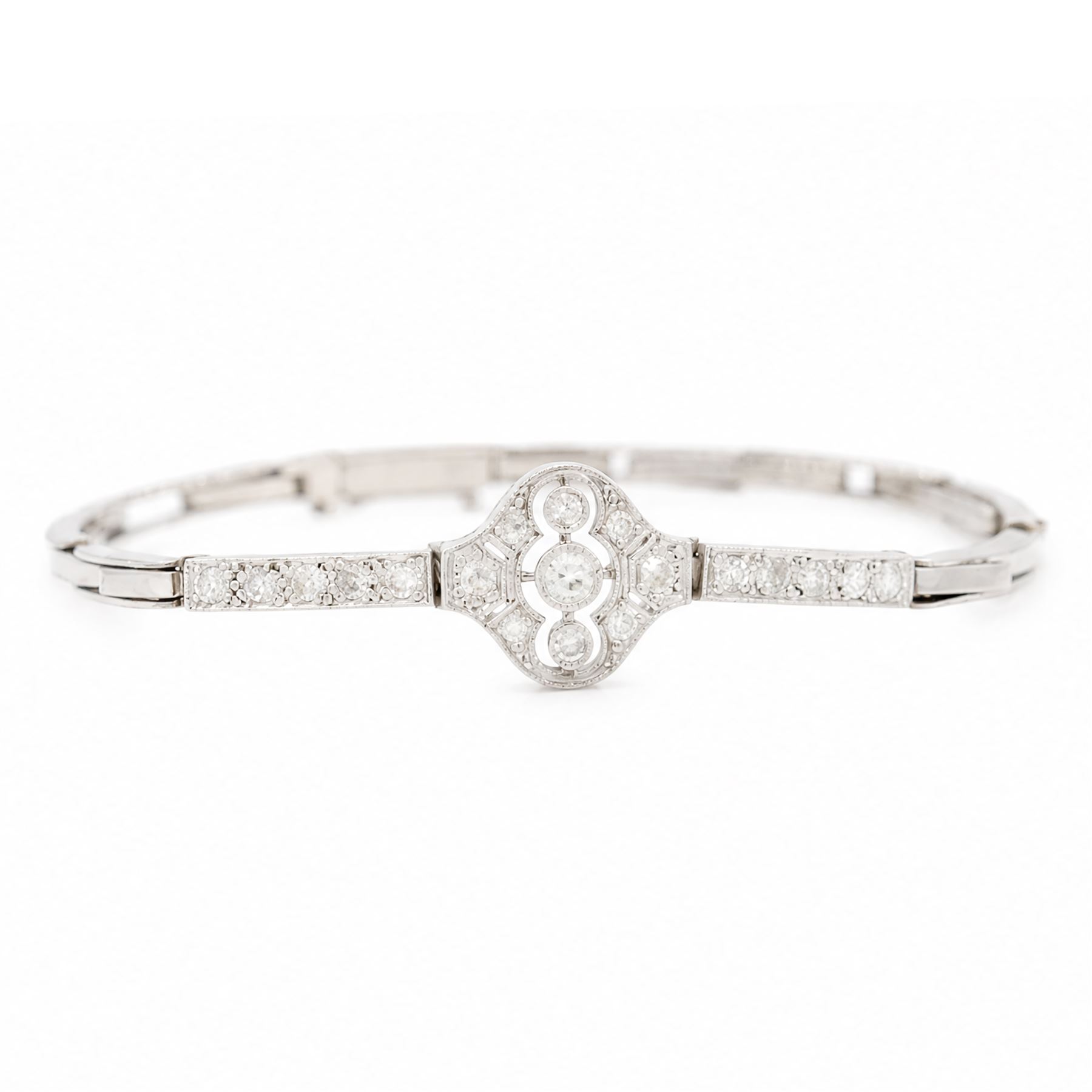 Art Deco white gold and platinum diamond bracelet, the central articulated panel milgrain set with old and single cut diamonds, to a white gold expanding link bracelet, stamped 18ct