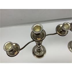 Pair of silver plated three branch candelabra, knop stemmes raises on stepped oval bases, H38cm