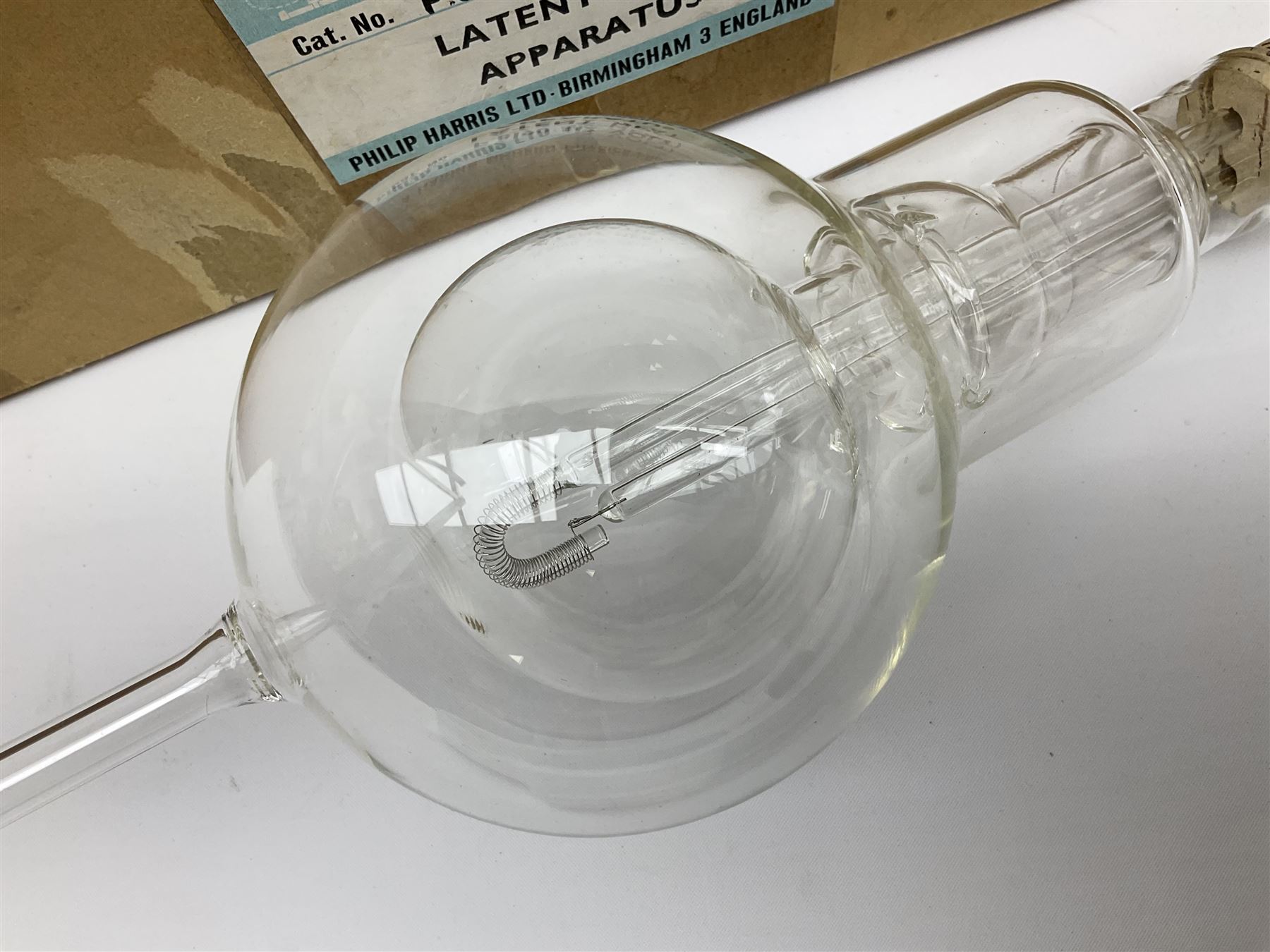 Quantity of laboratory and physics glassware including 'Guinea and Feather' equipment; boxed Latent Heat apparatus; Maltese Cross tube; atmospheric air pressure indicator flask; electroscope discharge tubes etc