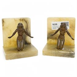 Pair of onyx bookends with bronze female figures