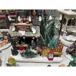 Christmas decorations; Premier LED Christmas Village scene with moving train, together with three Lumineo christmas scenes, and other similar 