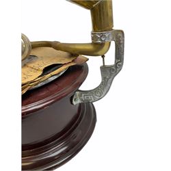 His Master's Voice table top wind up gramophone on a circular wooden base, with brass horn, H72cm, Horn D43cm. 