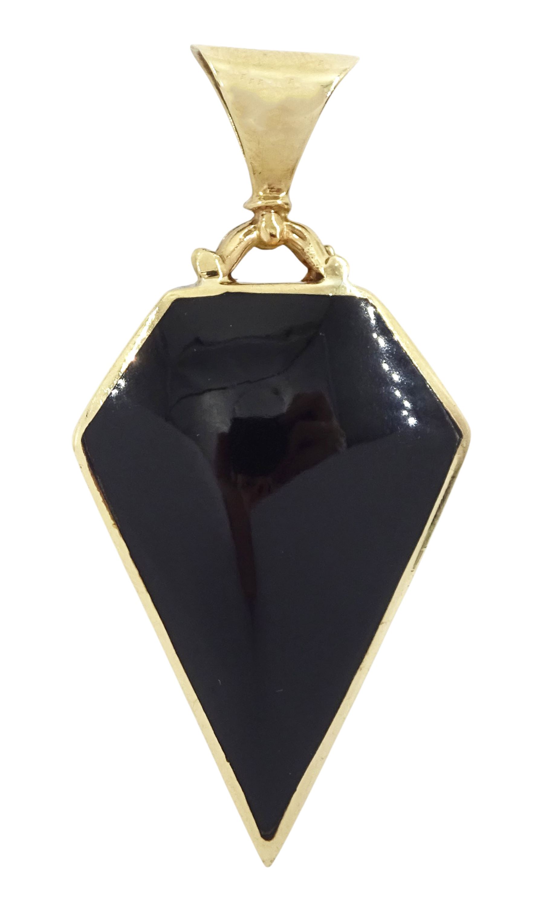 9ct gold kite shaped pendant, one side set with Whitby jet, the reverse set with Picasso jasper by C W Sellors, Sheffield 2001
