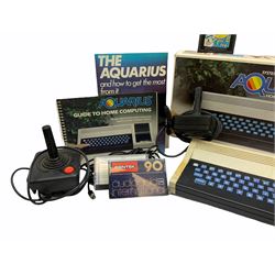 Mattel Aquarius Home Computer System c1982/3, with Mini-Expander, Data Recorder and 16K Memory, all boxed, and two instruction booklets; Grandstand Invader From Space and Palitoy Merlin electronic games; unopened blister packed Casio Portable TV-980; and quantity of game accessories