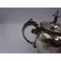 Late 19th century/early 20th century three piece Dutch silver tea service, comprising teapot, milk jug and open sucrier, each of squat circular form with pierced beaded rim, the teapot with ornate foliate scroll handle with ivory insulators, the sucrier with swing handle with beaded rim, maker's mark for J.M van Kempen & Son and lion standard marks for minimum 833 purity, teapot with lid H16cm This item has been registered for sale under Section 10 of the APHA Ivory Act