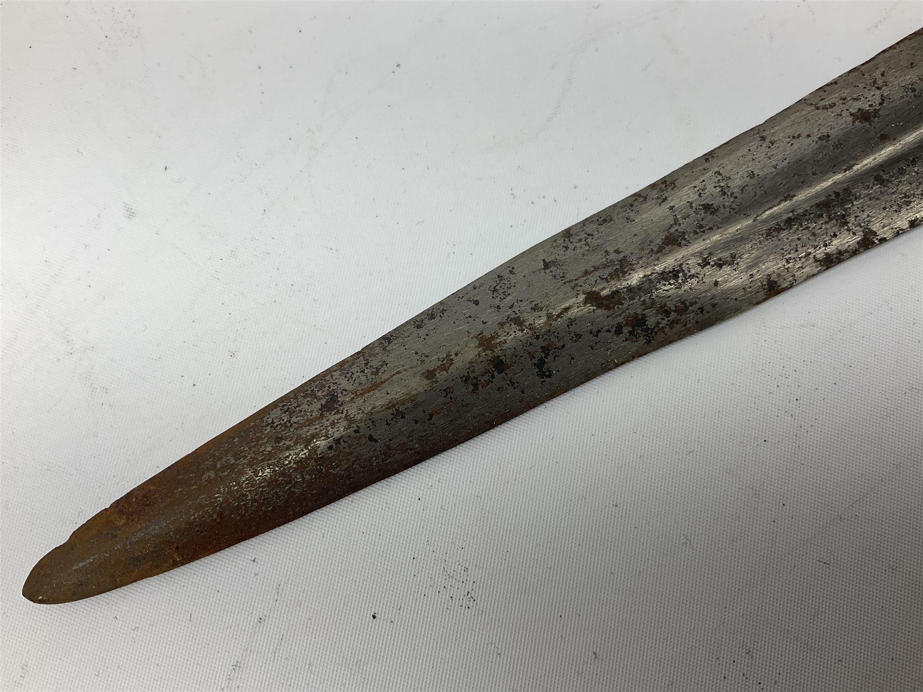 Indian thrusting dagger Katar the 25cm blade with swollen point and central rib, in leather covered wooden sheath L45cm overall