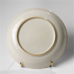 Chinese Yongzheng period coffee cups and saucer, painted in grisaille with figures in traditional landscapes and heightened in gilt (3)