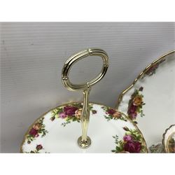 Royal Albert Old Country Roses pattern tea service for six, comprising teapot, sucrier, milk jug, dessert plates, one cake plate, one two tiered cake stand, salt and pepper pots and bud vase 