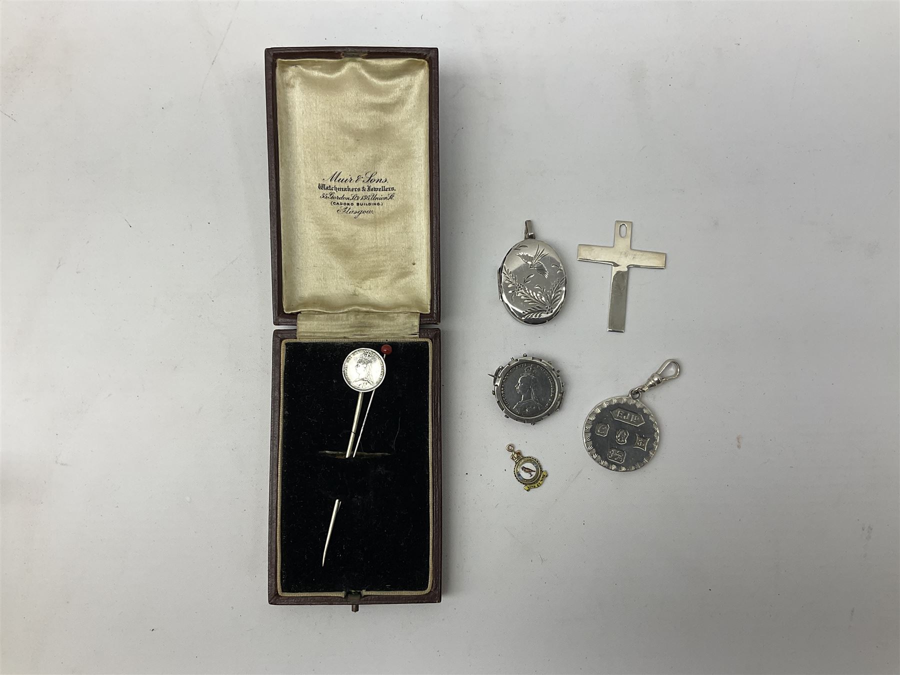 Modern silver locket, modern silver circular pendant, modern silver cross shaped pendant, small 9ct gold and enamel pendant, etc., approximate gross silver weight 40 grams, approximate gold weight 1.3 grams