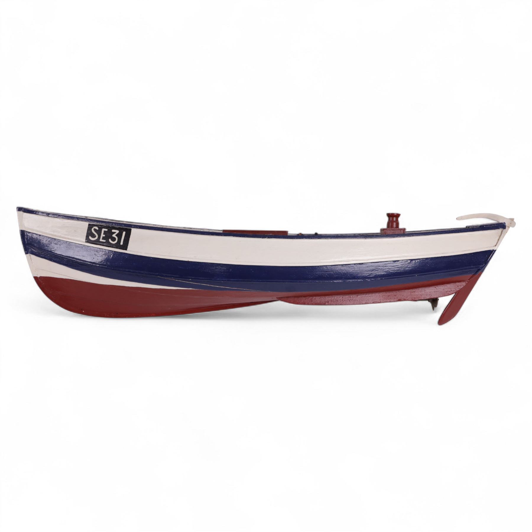 Two wooden fishing coble models, comprising SE31, with rudder, painted in blue, white and red and SSS.33 'Alice', painted in green, black and yellow, largest H16cm, L70cm